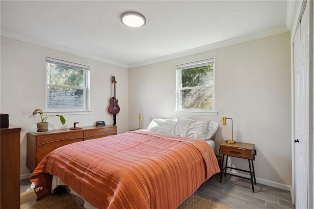 bedroom featuring crown molding