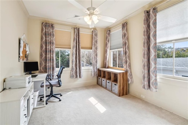 home office featuring crown molding, light colored carpet, and ceiling fan