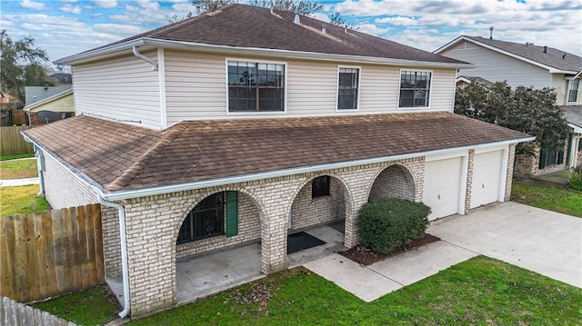 view of front of home with a garage