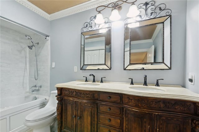 full bathroom featuring crown molding, tiled shower / bath, vanity, and toilet