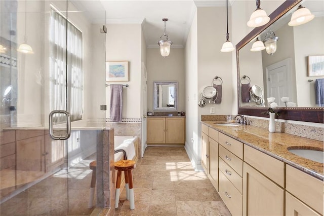 bathroom featuring crown molding, vanity, and separate shower and tub