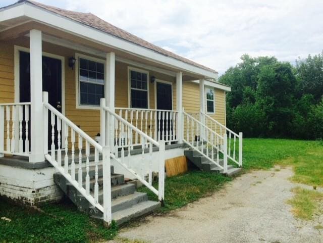 exterior space featuring covered porch