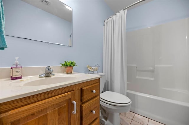 full bathroom with shower / bath combo with shower curtain, tile patterned floors, toilet, and vanity