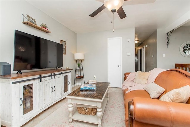 living room featuring ceiling fan