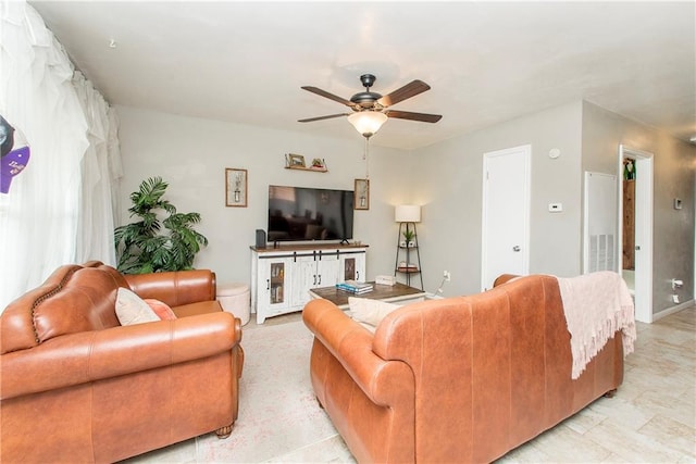 living room featuring ceiling fan