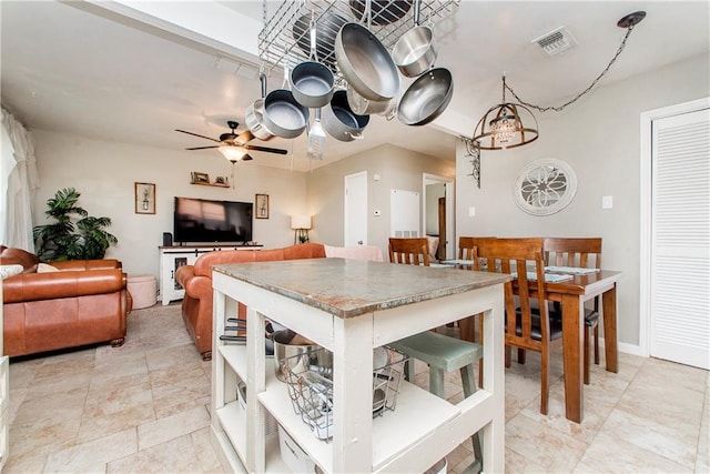 kitchen featuring ceiling fan