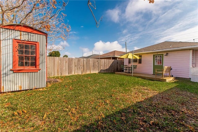 view of yard featuring a deck