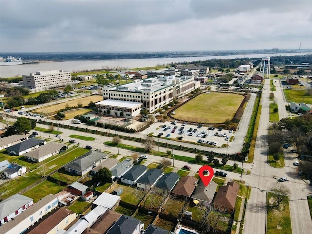 bird's eye view with a water view