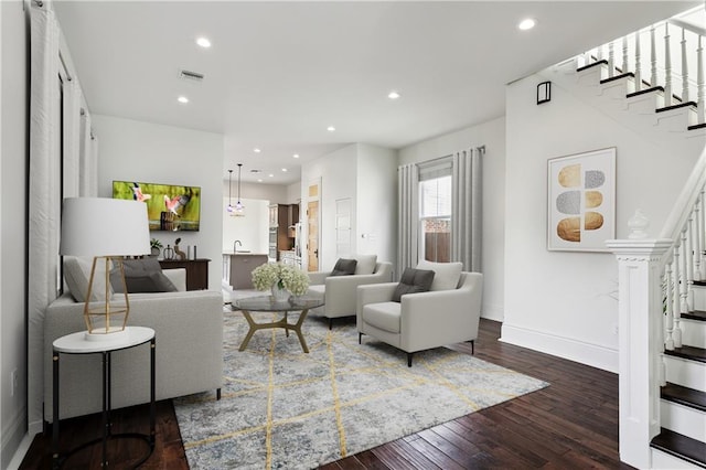 living room with dark wood-type flooring