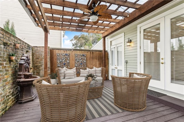 deck featuring a pergola, outdoor lounge area, french doors, and ceiling fan