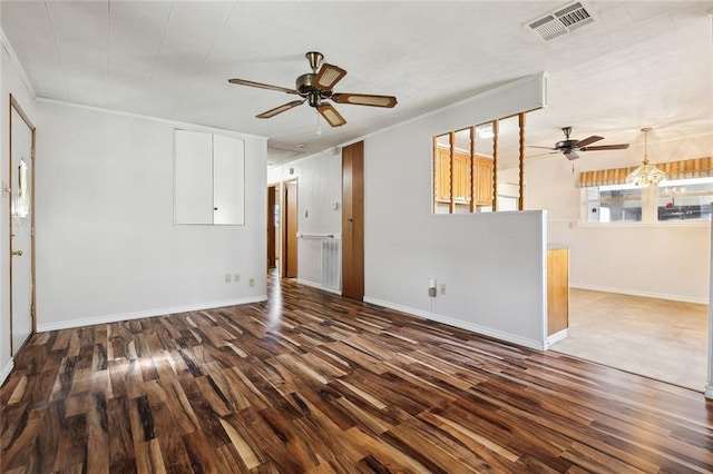 unfurnished living room with a ceiling fan, visible vents, ornamental molding, and wood finished floors