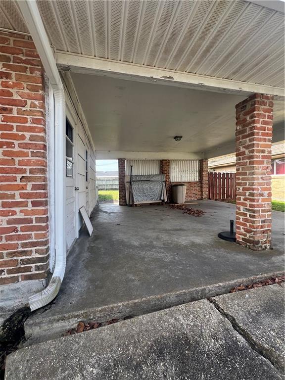 view of patio featuring a carport