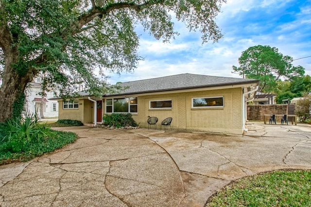 rear view of property with a patio area