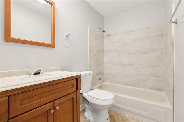 full bathroom featuring vanity, tile patterned floors, toilet, and tiled shower / bath