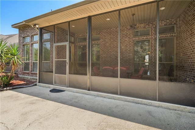 property entrance featuring a patio area