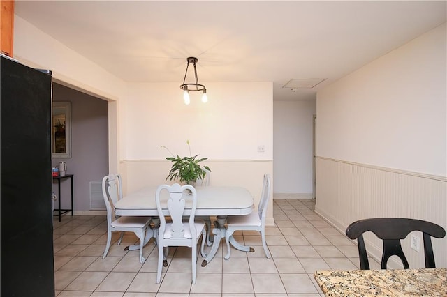 view of tiled dining room