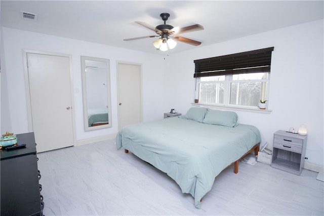 bedroom featuring ceiling fan