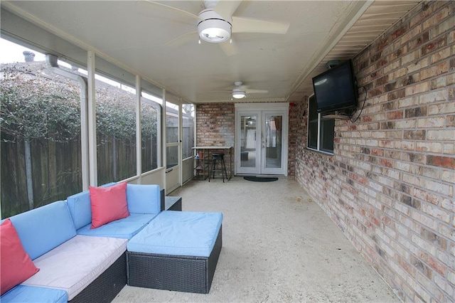 view of patio featuring an outdoor living space, french doors, and ceiling fan