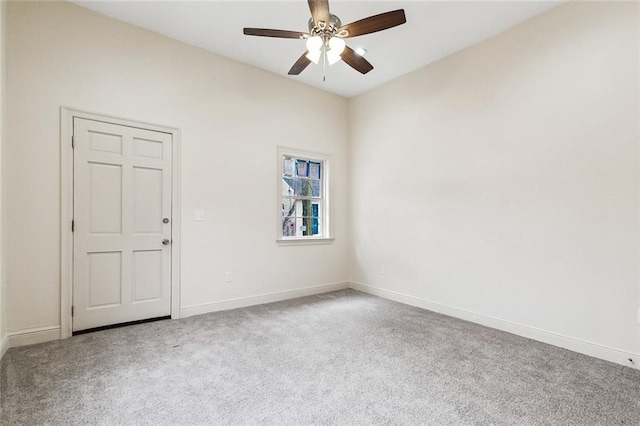 unfurnished room featuring carpet floors and ceiling fan