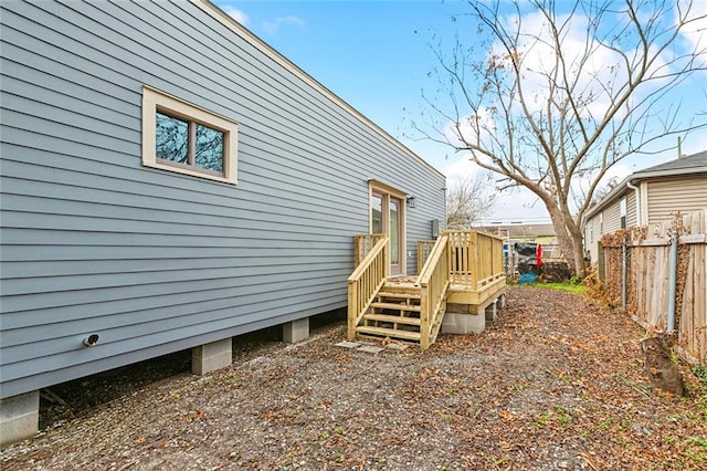 exterior space featuring a wooden deck