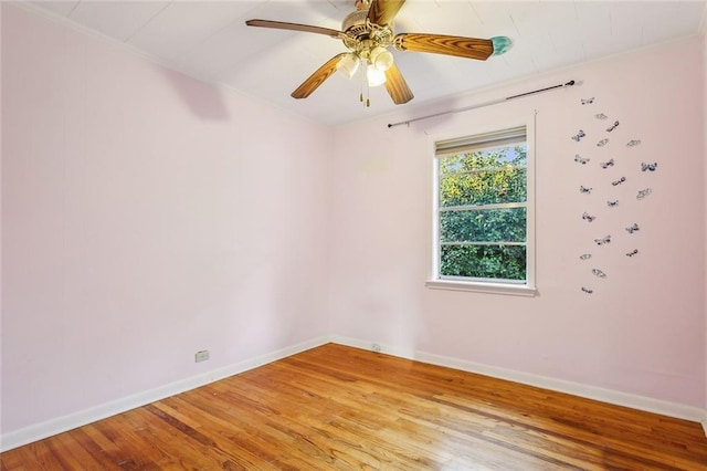 empty room featuring light hardwood / wood-style floors and ceiling fan