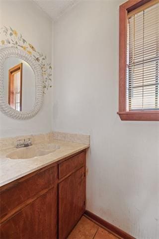 bathroom with vanity and tile patterned floors