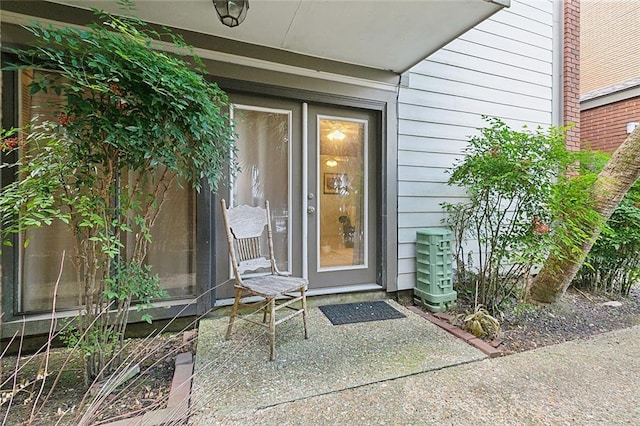 entrance to property with a patio area