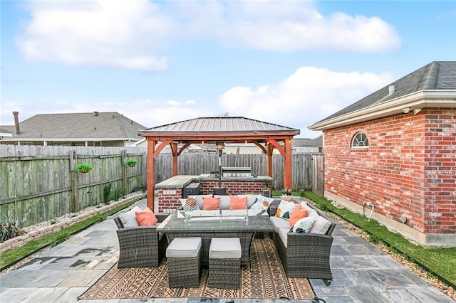 view of patio with a gazebo and outdoor lounge area