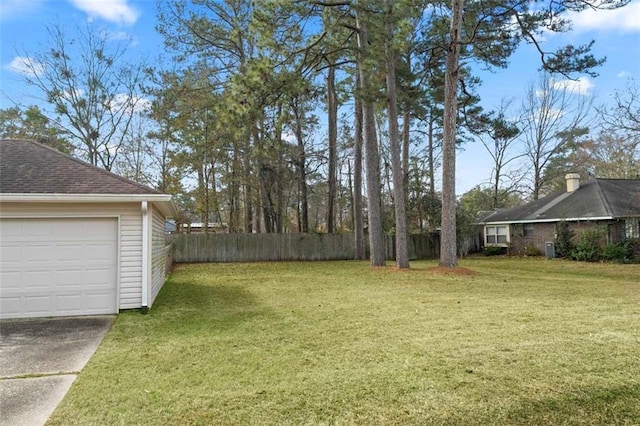 view of yard featuring a garage