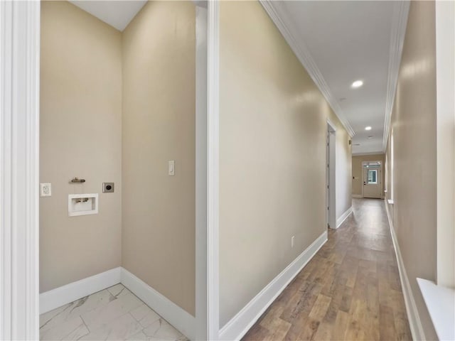 corridor featuring crown molding