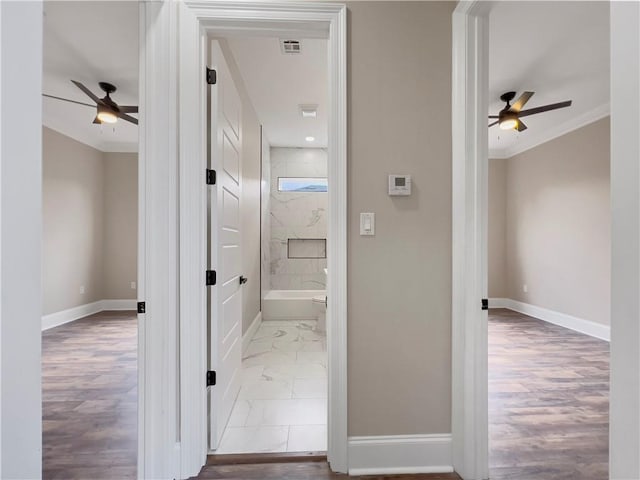 hallway with crown molding