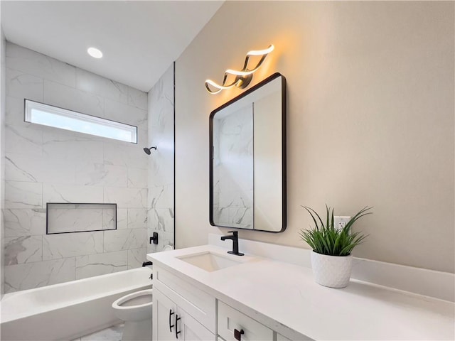 full bathroom featuring vanity, toilet, and tiled shower / bath combo