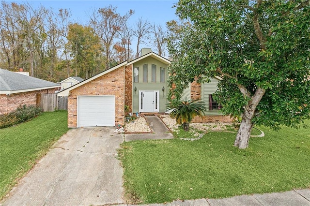 view of front facade with a garage and a front lawn