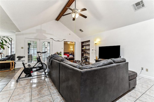 living room with ceiling fan, beam ceiling, high vaulted ceiling, tile patterned floors, and french doors