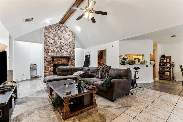 living room featuring light tile patterned floors, ceiling fan, beam ceiling, high vaulted ceiling, and a fireplace