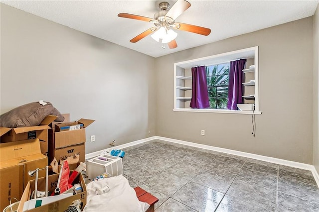 empty room featuring ceiling fan