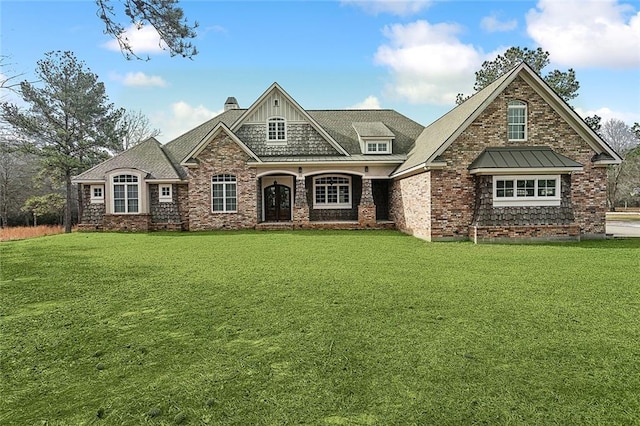 view of front facade featuring a front yard