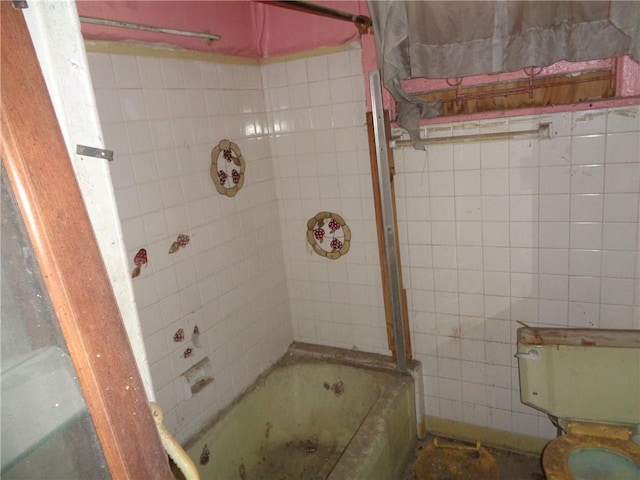 bathroom featuring a tub to relax in