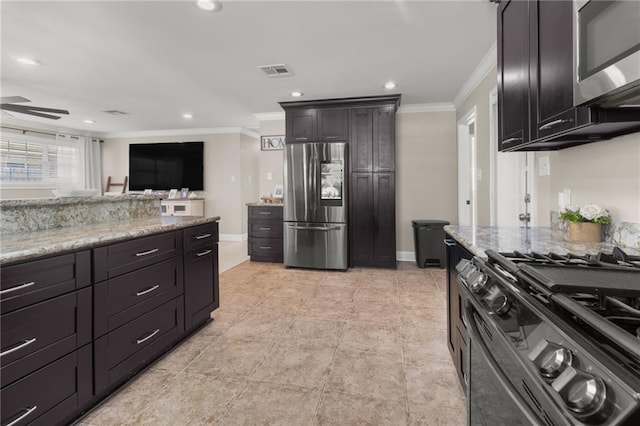 kitchen featuring light stone countertops, crown molding, stainless steel appliances, and ceiling fan