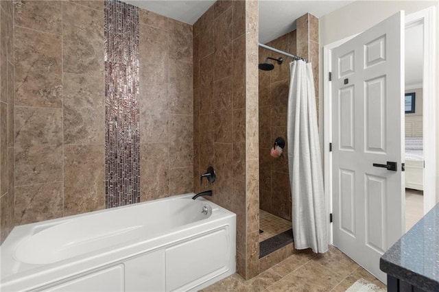 bathroom featuring vanity and separate shower and tub