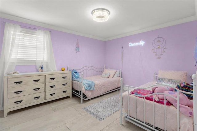 bedroom with ornamental molding