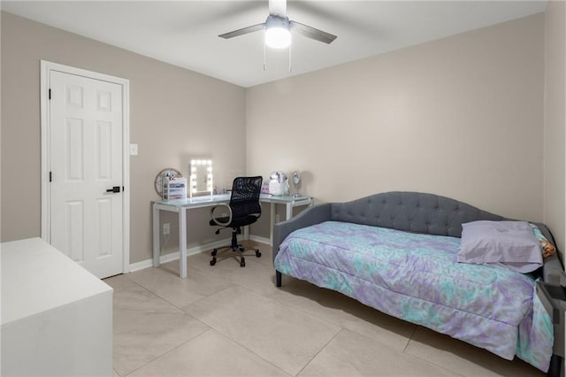 bedroom featuring ceiling fan and tile patterned floors