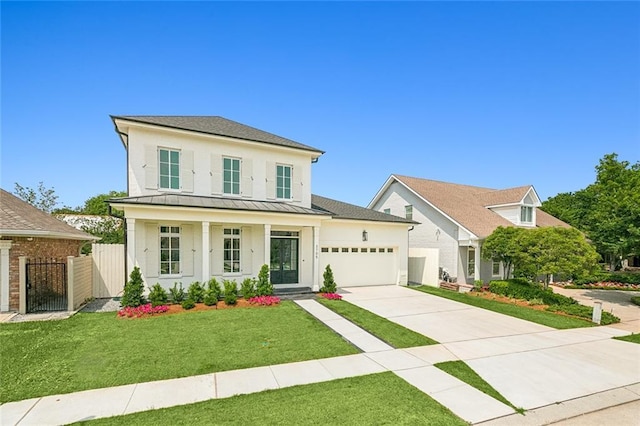 3705 Rue Emilion Dr, Metairie, LA 70002 - modern farmhouse featuring a standing seam roof, a garage, concrete driveway, a metal roof, and stucco siding