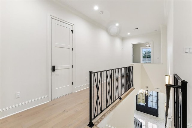 3705 Rue Emilion Dr, Metairie, LA 70002 - hall with an upstairs landing, recessed lighting, wood finished floors, and ornamental molding