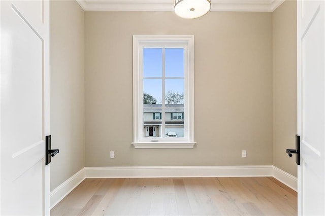 3705 Rue Emilion Dr, Metairie, LA 70002 - spare room featuring light wood-type flooring and crown molding