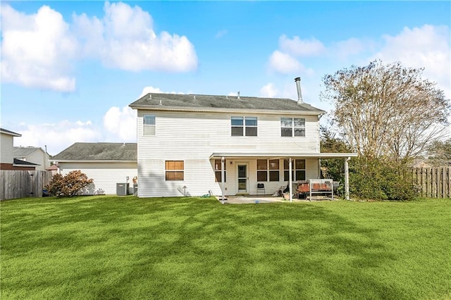 rear view of house featuring a patio, cooling unit, and a lawn