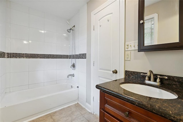 bathroom with tile patterned floors, shower / bathing tub combination, and vanity