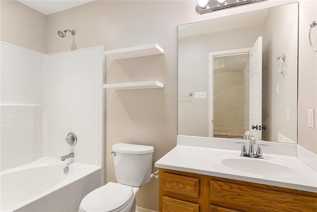 full bathroom with vanity, toilet, and  shower combination