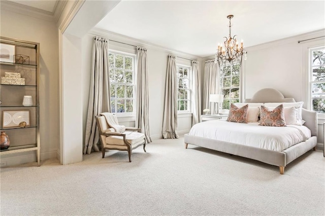 bedroom with multiple windows, crown molding, carpet flooring, and a notable chandelier