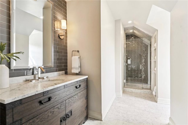 bathroom with vanity and an enclosed shower